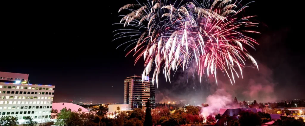 Luxury cityscape at night with fireworks